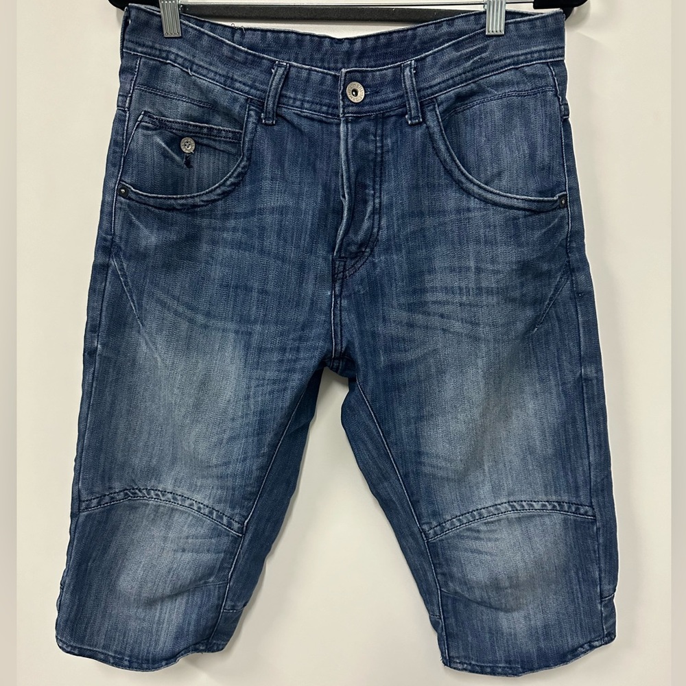 Blue Jean faded shorts (Jorts) below the knee fit. Fun and sporty.